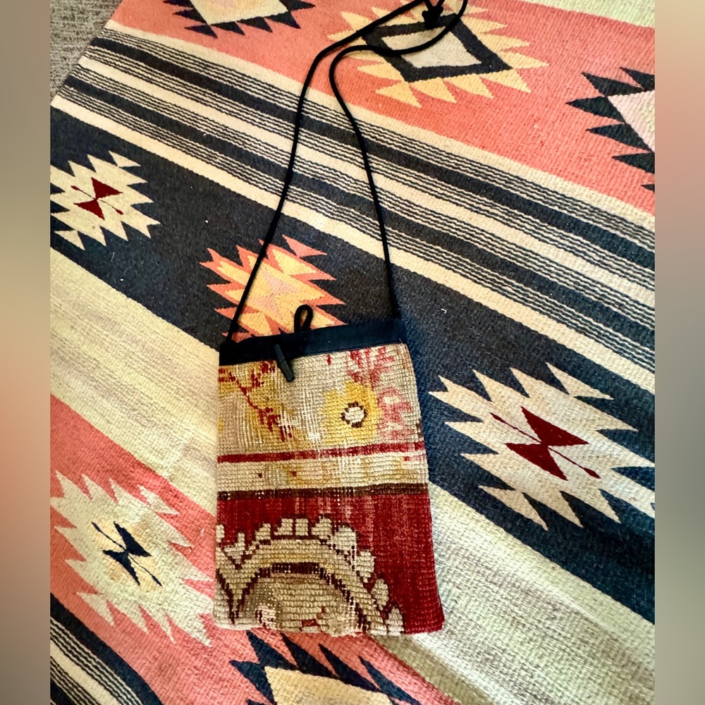 A vintage Kilm rug repurposed into a lovely shoulder bag.